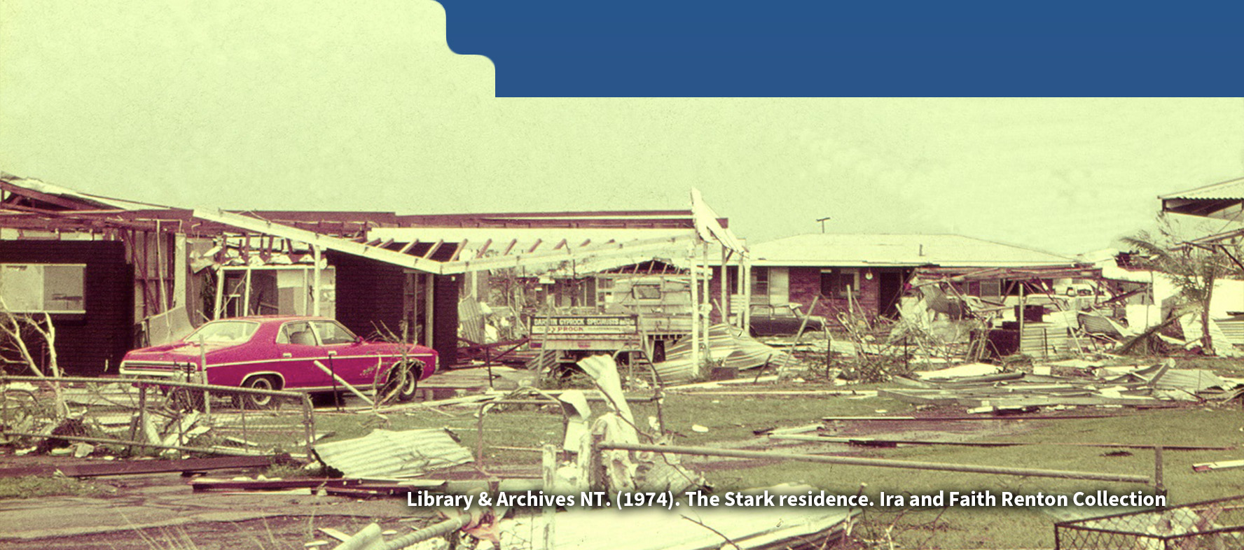 Photo showing extensive destruction in Darwin caused by Cyclone Tracy, with buildings reduced to rubble and debris scattered across the area